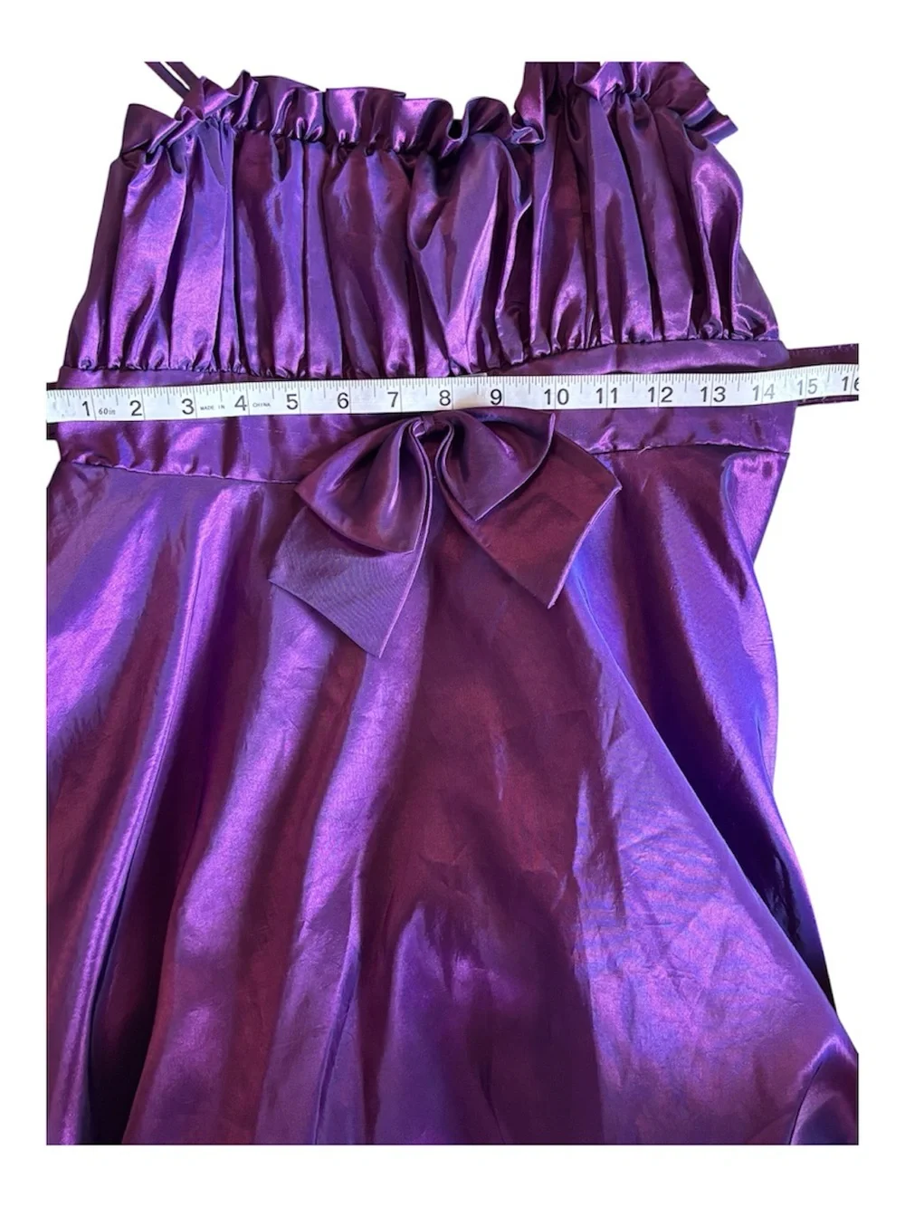 My Best Kids beautiful satin-look purple party dress with straps and full skirt.